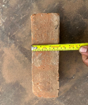 Handmade reclaimed bricks stacked