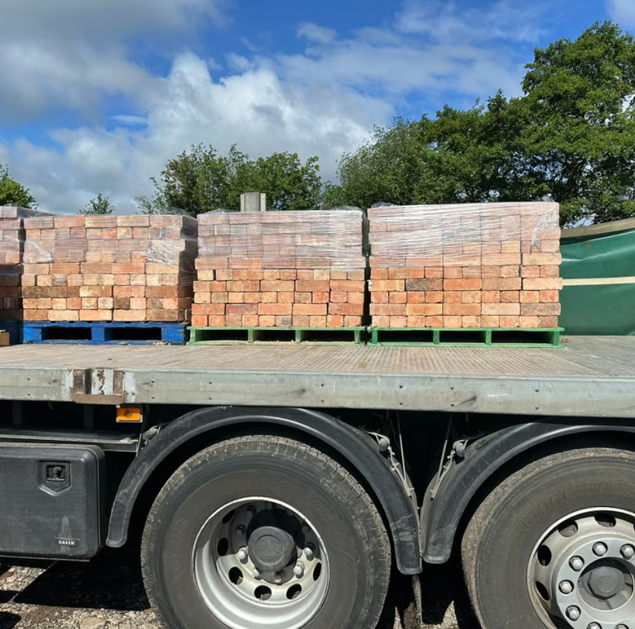 Stacked reclaimed bricks ready for heritage restoration