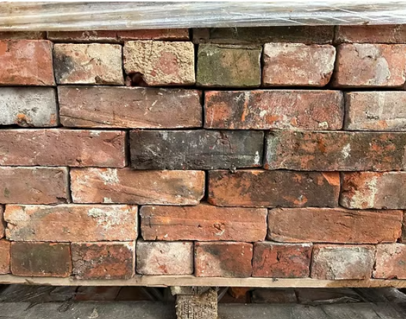 Large pallet of reclaimed bricks ready for UK delivery